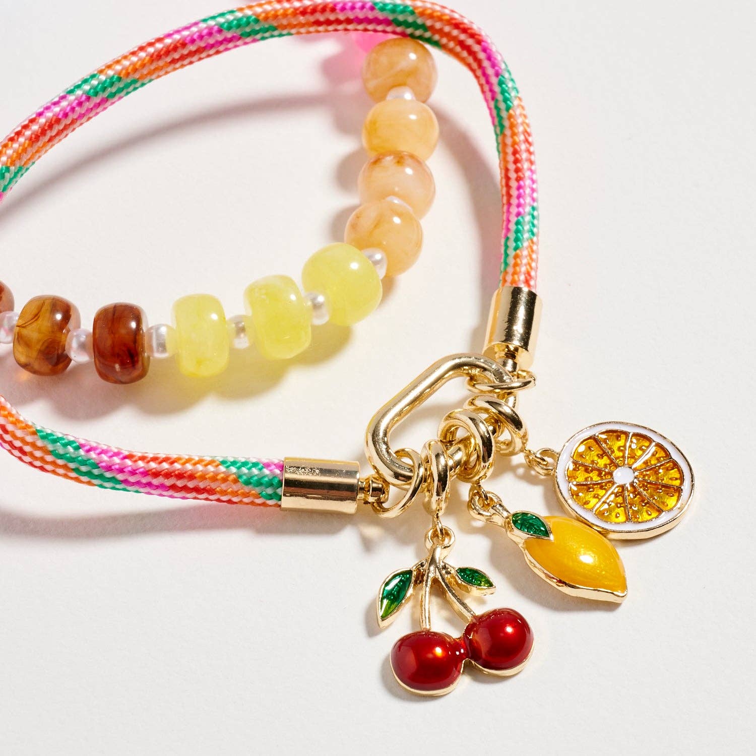 Double Layer Beaded Stretch & Cord Bracelet with Gold Tone Charms