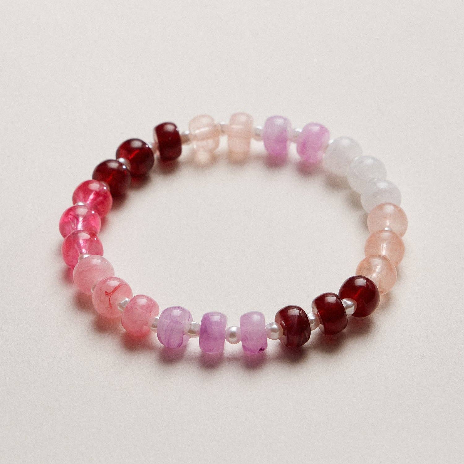 Double Layer Beaded Stretch & Cord Bracelet with Gold Tone Charms